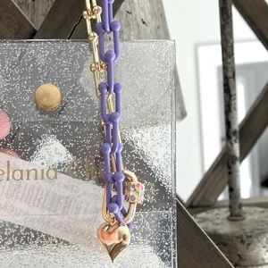 *Never worn* purple and gold chain with heart